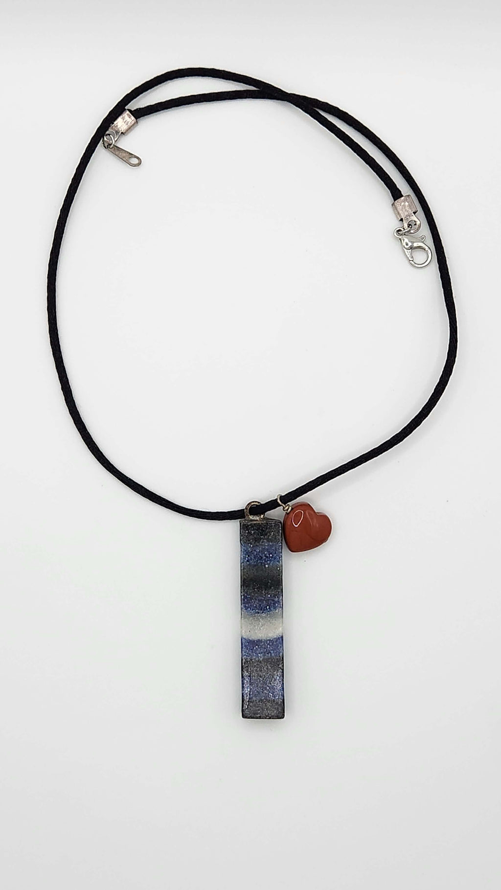 Bold Leather Pride necklace crafted with genuine gemstone sand and premium materials. On durable nylon cord with natural stones.
